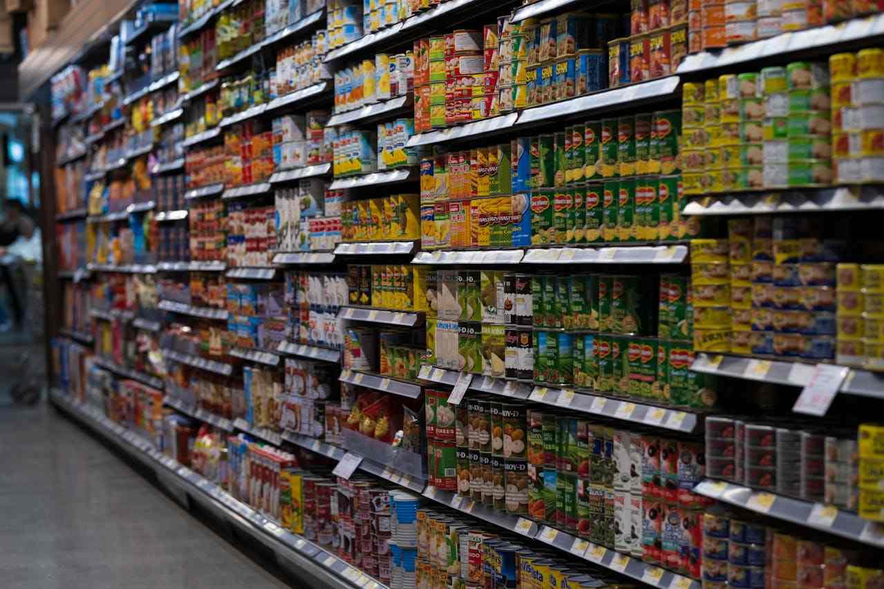 Cleanly stacked retail store shelves displaying products lineup